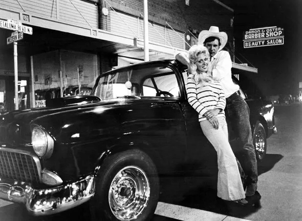 Harrison Ford with a 1955 Chevrolet 150 in American Graffiti